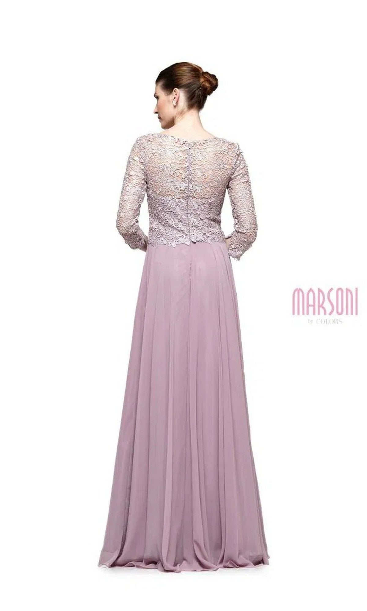 A woman faces away, wearing the Marsoni M223 long formal dress with a lace bodice, long sleeves, and a flowing mauve chiffon skirt. Her hair is styled in a neat bun against a plain white background.